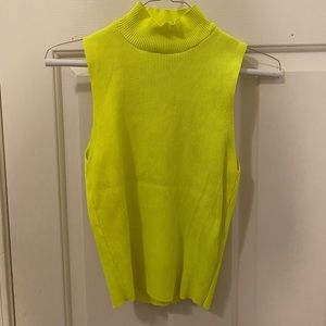 Yellow sleeveless turtleneck